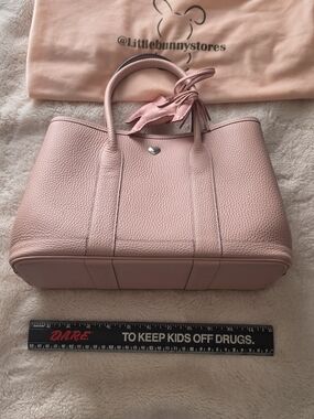 Soft Pink Pebbled Leather Tote with Tassel Charm